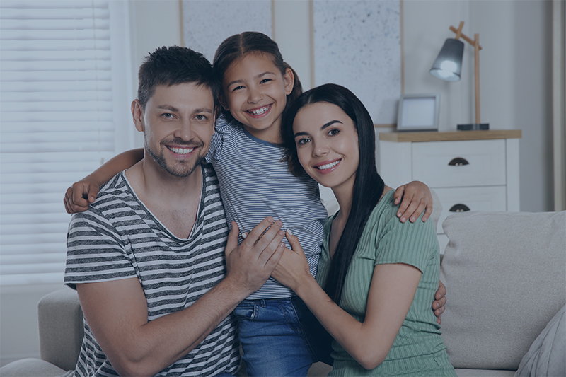 Happy parents and their daughter in Morris County, family law concept.