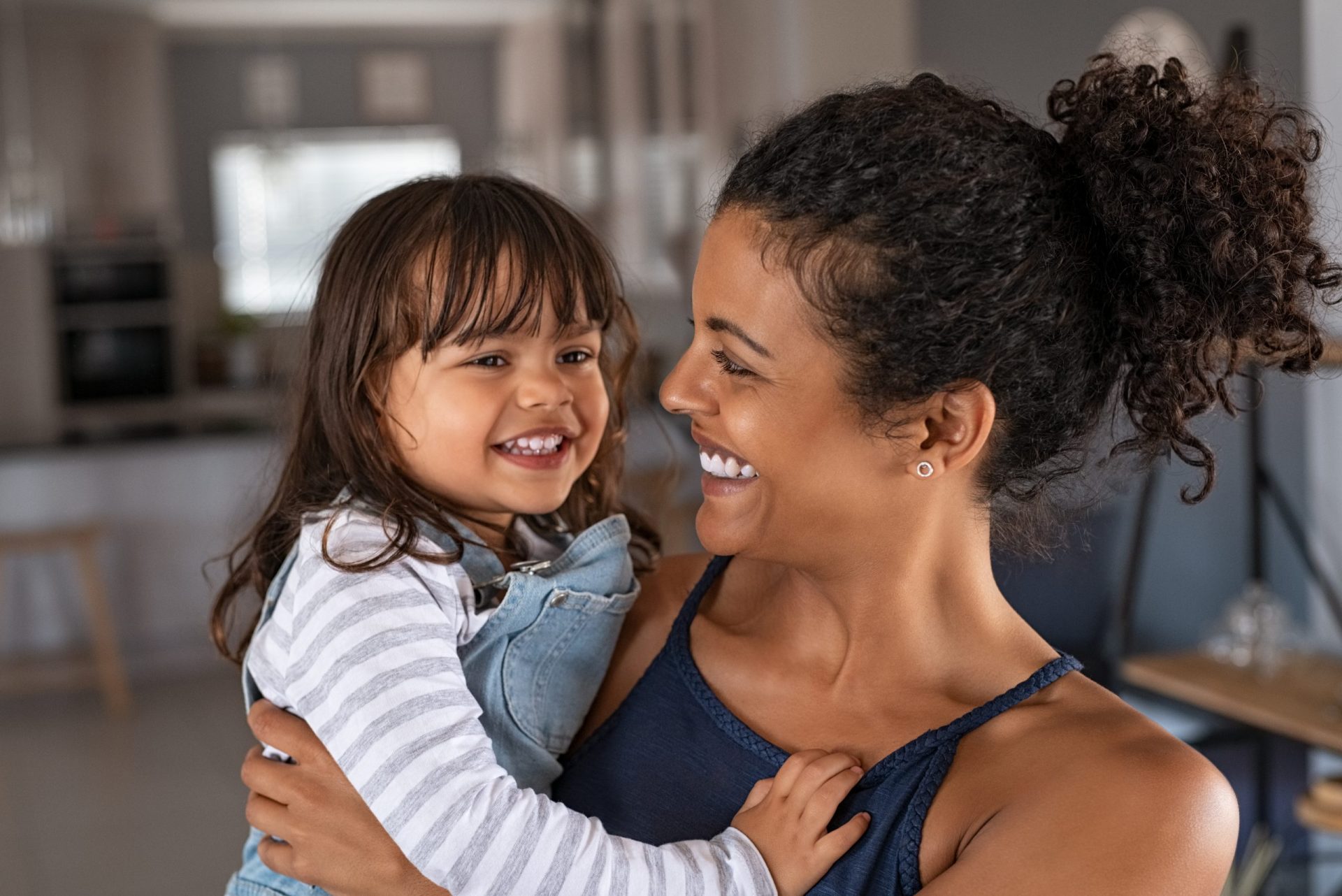 Smiling mother and her daughter in Morris County, family law concept.